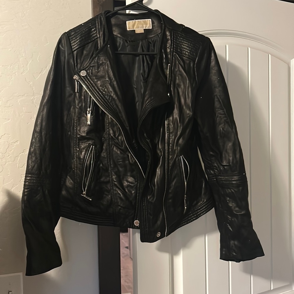 Size small black Michael Kors 100% leather shell.